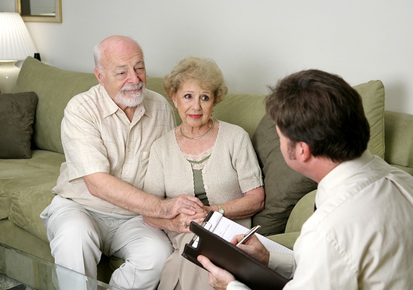 older couple talking to counselor